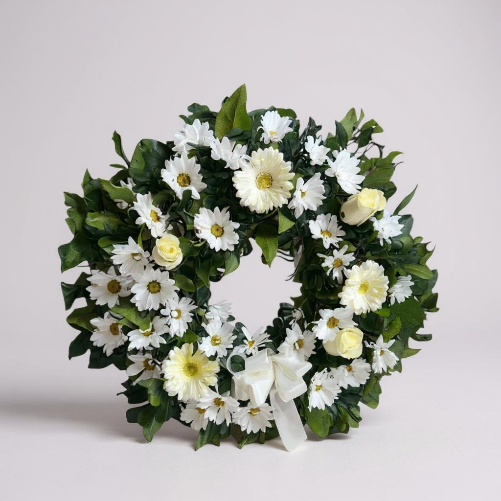 Corona fúnebre blanca