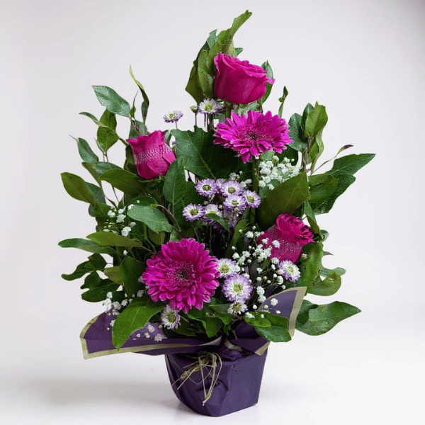 Arreglo floral pequeño fucsia