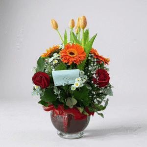 Pecera redonda mix de tulipán rosas y gerberas