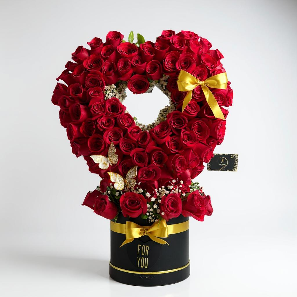 Box de 100 rosas rojas en forma de corazón