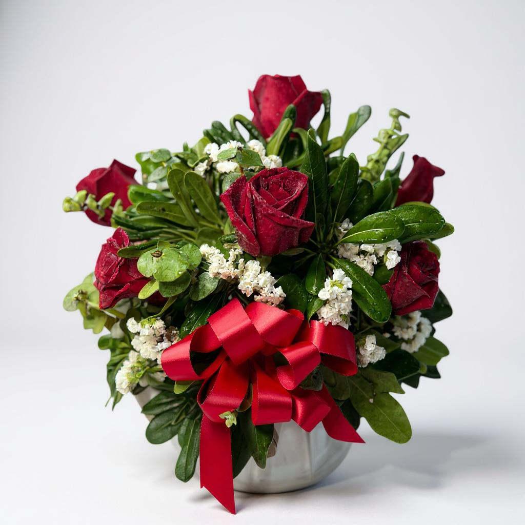 Pecera de 8 rosas rojas